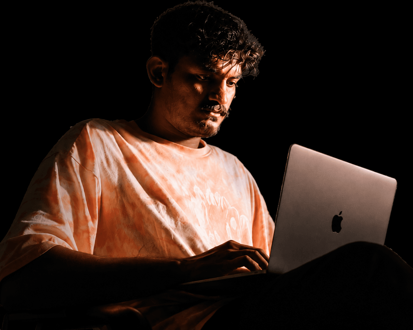 Mohammed Rinshad P working on laptop